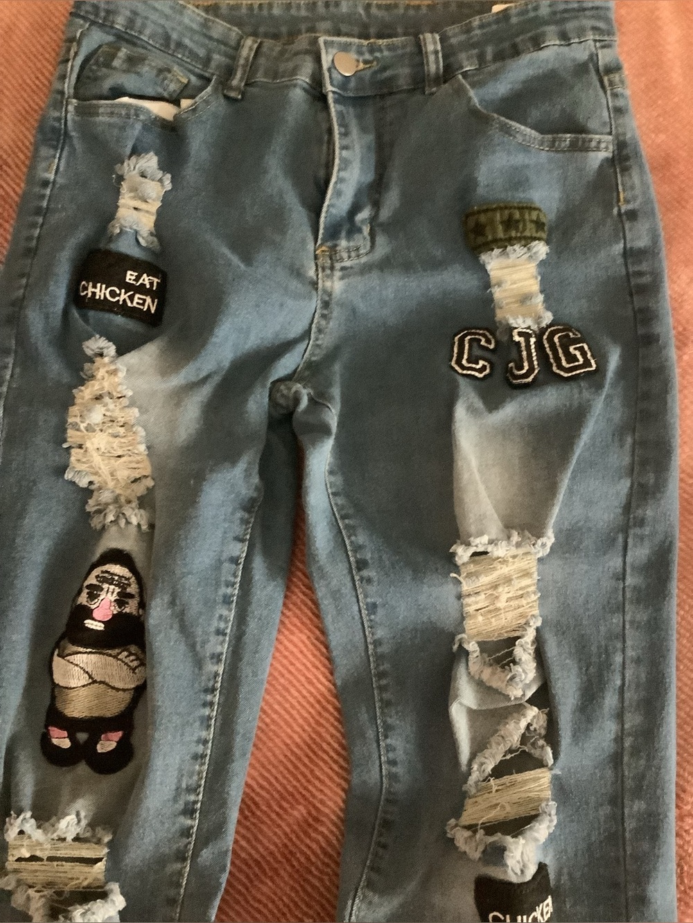 Distressed Light Blue Patchwork Jeans with Embroidered Patches